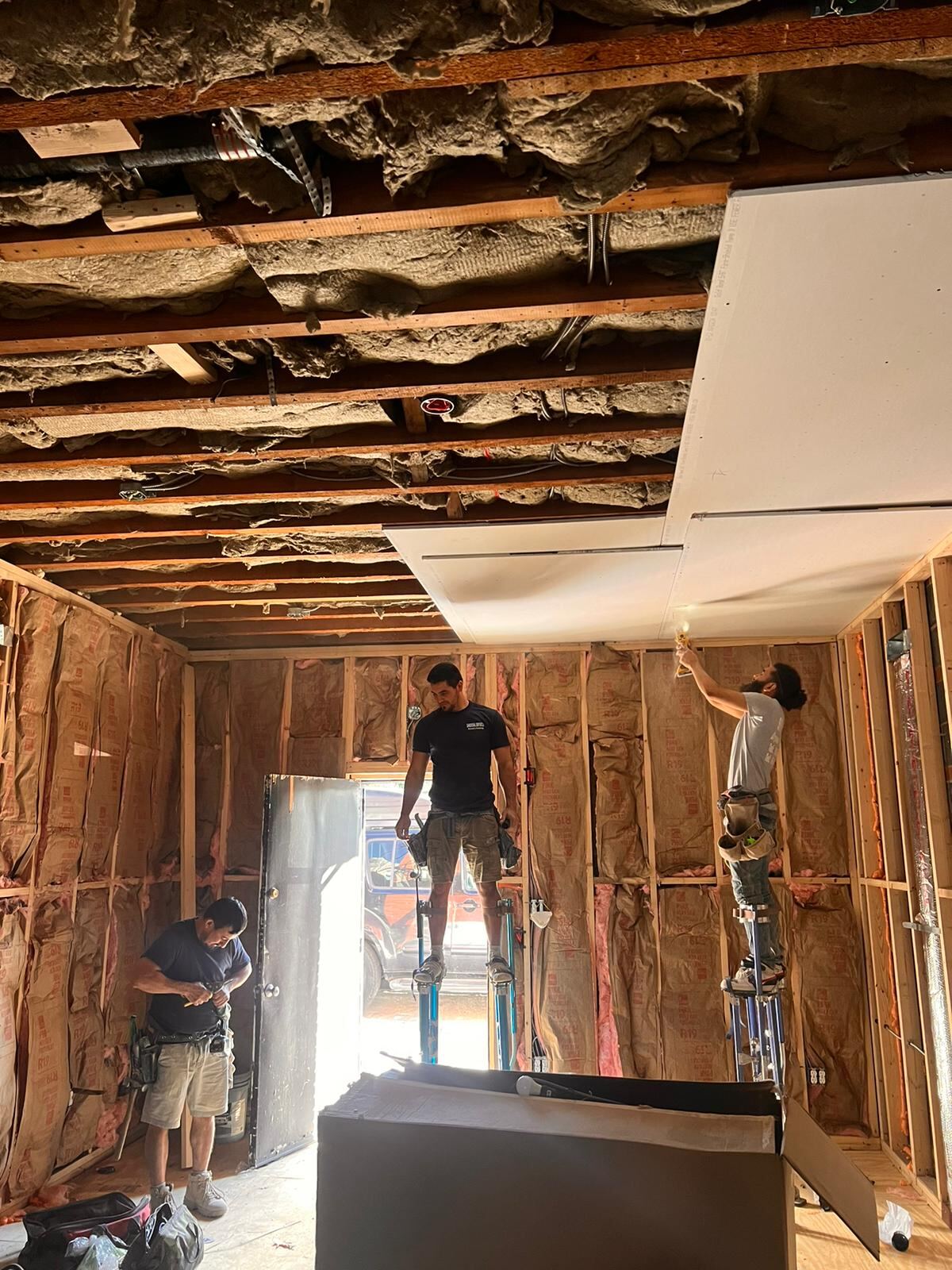 Drywall ceiling installation and framing in a residential renovation by Affinity Contractors carpenters
