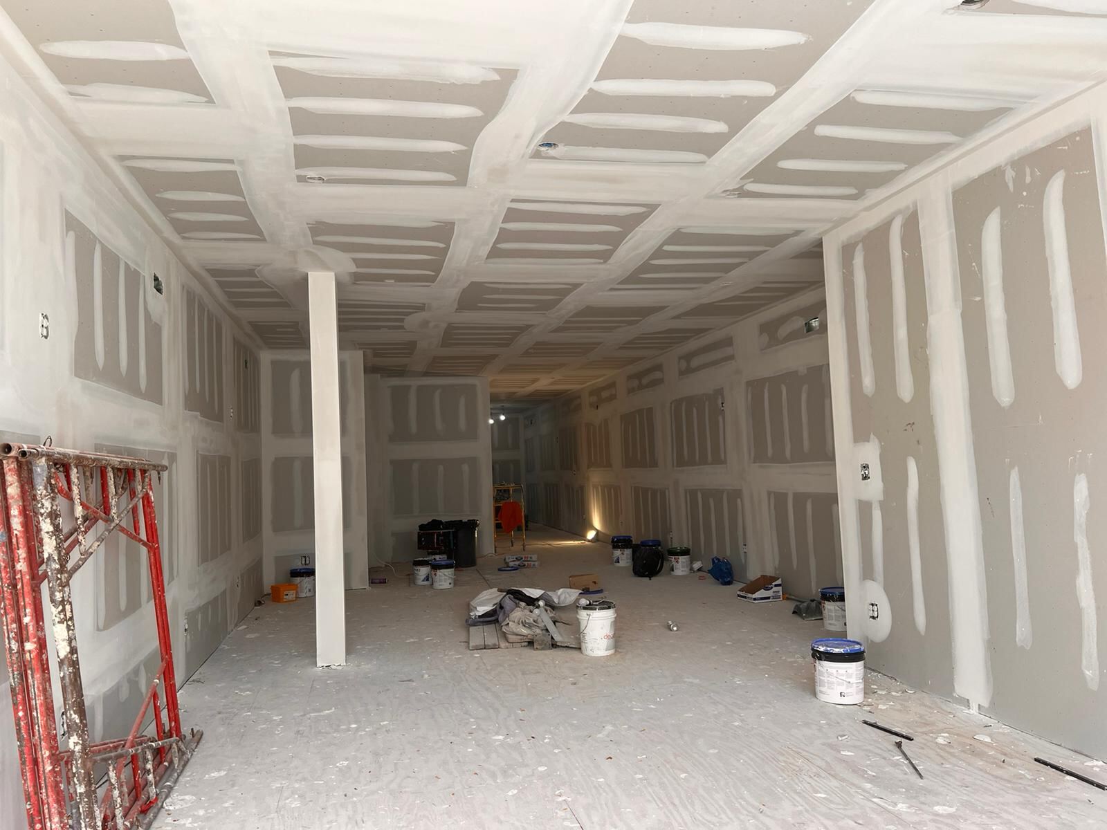 Completed drywall finishing and taping in a large interior buildout by Affinity Contractors in Philadelphia