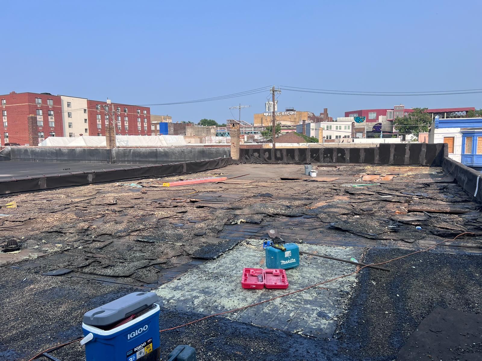 Commercial flat roof tear-off and replacement project in Philadelphia by Affinity Contractors roofing crew